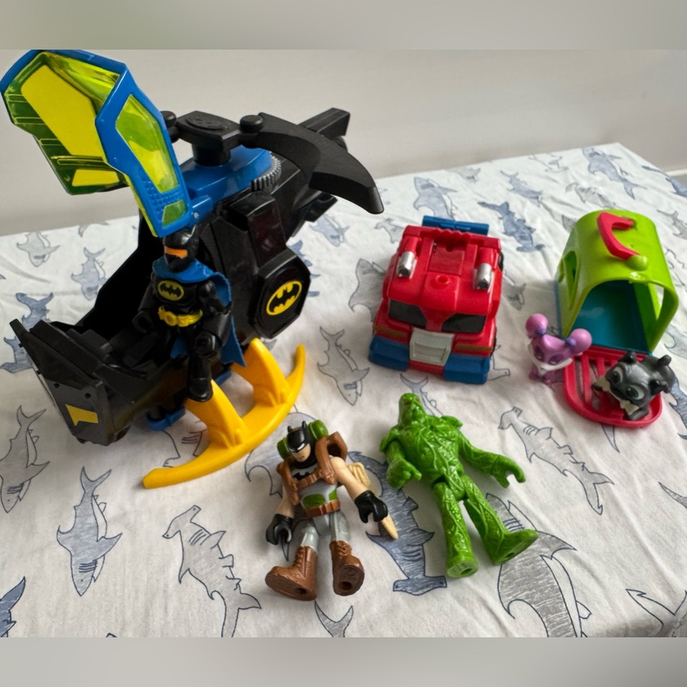 Miscellaneous Action Figures and Batman with helicopter and transformer